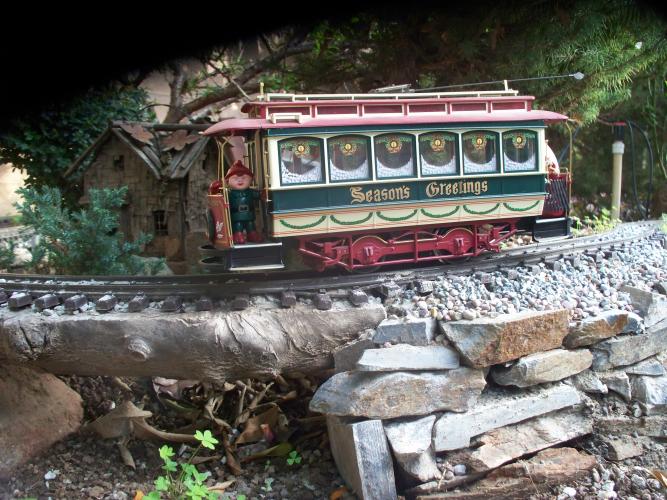 Christmas trolley on rebuilt Red Mountain retaining wall.